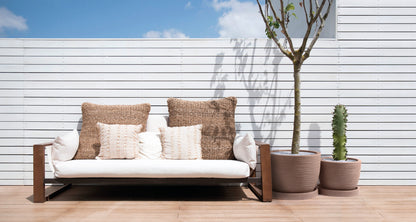 View,Of,A,Modern,Simplistic,White,Outdoor,Sofa,On,A